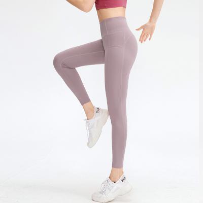 China Breathable Women's Naked Feeling Workout Leggings With Side Pockets 4 Way Stretch High Waist Yoga Pants Workout Leggings For Women for sale