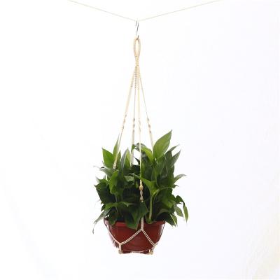 China Hot-selling Cotton Macrame Plant Hangers Wholesale Handmade Macrame Basket Home Decor for sale