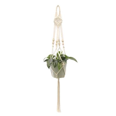 China Handcrafted Wholesale Macrame Plant Hangers Macrame Plant Basket Macrame Home Decor for sale