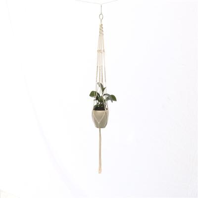 China Hot-selling Cotton Macrame Plant Hangers Handmade Hanging Basket Macrame Home Decor for sale