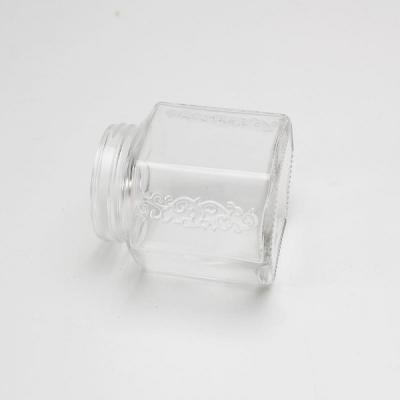 China Durable Hexagonal Glass Jar 5ml -5000ml Customized Food Storage Glass Jar for sale