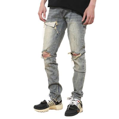 China Sustainable Custom Fashion Destroyed Jeans Ripped Waist Highwaist Skinny Jeans Men for sale