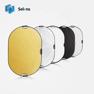 China Selens faric reflective 120x180cm 5 in 1 oval folding light reflector with handle grips for sale