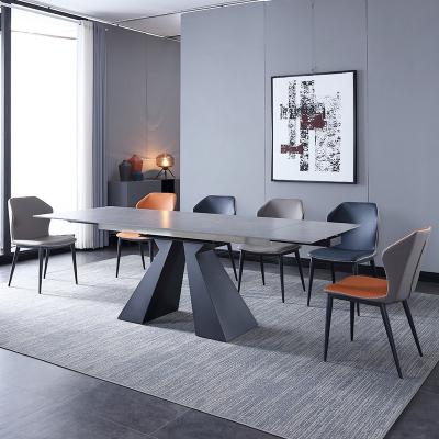 China Modern Slate Designer Simple Modern Rectangular Dining Table and Chair Stretch Dining Table for sale