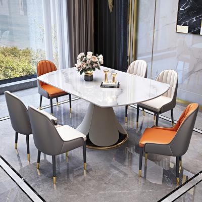 China Modern Light Luxury Stone Dining Table Chipboard Retractable Revolving Dining Table For Home Hotel for sale