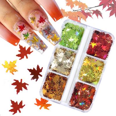 China Hot Selling Trendy 6grids Mixed Color Holographic Metallic Marple Fall Nail Decoration Leaves Nail Glitter Stickers for sale