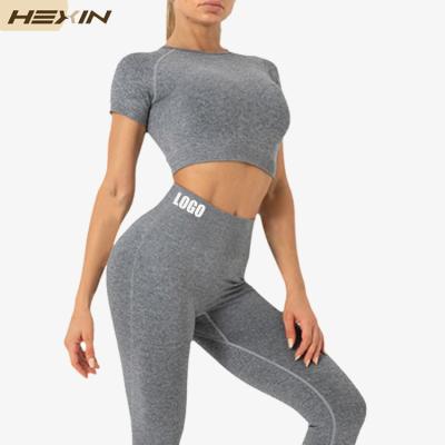 China HEXIN Customs Workout Simple Crop Top Yoga Gym Sets Women Activewear Seamless Set for sale