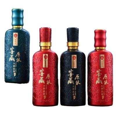 China Wholesale Luxury Beverage Wine Glass Bottles 500ml To Empty Imitate Ceramic Whiskey Brandy Gilding Wine Decanter for sale