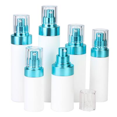 China Custom Colored Liquid Soap Cosmetic Packaging Plastic Bottles PP Cosmetic Lotion Bottle With Shiny Blue Aluminum Airless Pump for sale