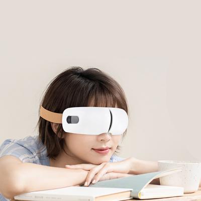 China Music EYE Care Air Pressure Care Foldable Rechargeable Radio Vibrating Eye Massager with Graphene Heating for sale