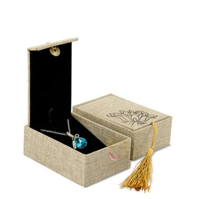 China Customizable in Stock Hot Selling Luxury Pink Cardboard PaperJewelry Packaging Box in Gold Leather Velvet Material Durable Use for sale