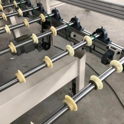 China Conveyor Table Conveyor Table Nylon Disc Roller Haul-U Automation Wear Resistant Equipments For Glue Spreader Machine With Electric Powered for sale