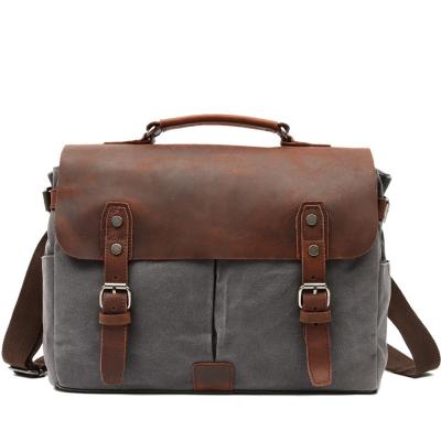 China Spooky Man Bag Vintage Border Leather With Canvas Laptop Bag Handheld Single Shoulder Diagonal Bag for sale