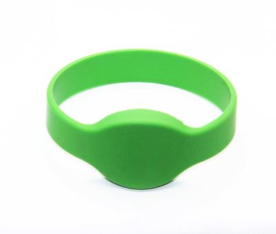 China Customized Waterproof / Waterproof Logo Access Control RFID Silicone Wristband for sale