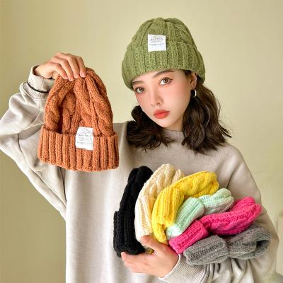 China The picture shows fashionable winter woven warm outdoor tank top hats knitted winter hats women's running warm men's thick thin for sale