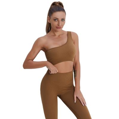 China Wholesale Breathable Women's 2 Pieces Fit Workout One-Shoulder Crop Top High Waist Yoga Long Legging Sets for sale