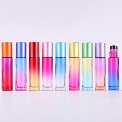 China 10ml Refillable Empty Perfume Essential Oil Gradient Colored Glass Roll On Roller Bottles With Trackball for sale