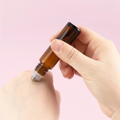 China 10ml Amber Glass Roller Bottles Leakproof Essential Oil Cosmetic Bottles with Stainless Steel Roller Balls for sale