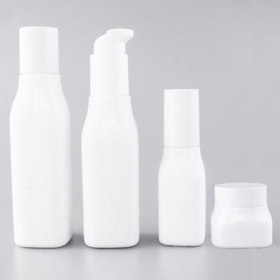 China 40ml 100ml 120ml Cosmetic Empty Glass Porcelain Sprayer White Lotion Bottles 50g 150g Cream Jars Skin Care Sets Packaging for sale