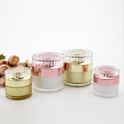 China Luxury Acrylic Empty Rose Gold Eye Cream Plastic Cosmetic Cream Jars 30g 50g With Clear Lid for sale