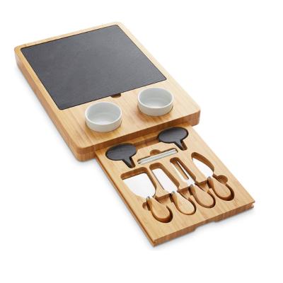 China Large Sustainable Bamboo Cheese Cutting Dishes Board Set and Knife Set with Hidden Slide Out Charcuterie Tray Wooden Slate Cheese Board for sale