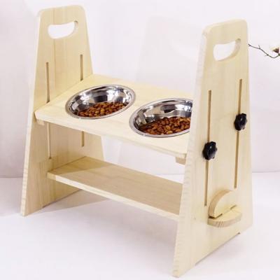 China Small Stored Adjustable Bamboo Wood Elevated Pet Bowls Elevated Feeder For Dogs Cat Food And Water Bowls Stand Up Wooden Pet Feeder for sale