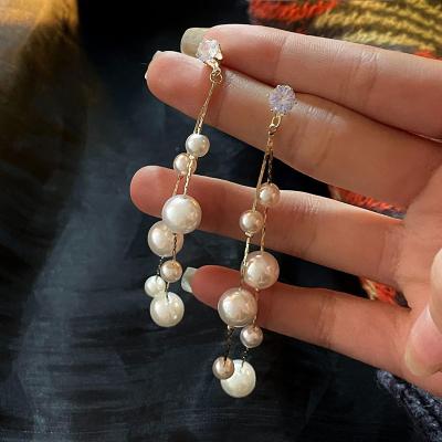 China CLASSIC style palace style long pearl tassel earrings fairy Zircon earrings design sense autumn and winter earrings for sale