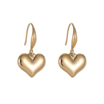 China FASHIONABLE Simple Solid Gold Plated Stainless Steel Small Cool Love Peach Heart Earrings 14k Ins Stainless Steel Love Ear Hook Beautiful for sale