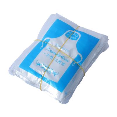 China Wholesale Disposable Plastic Waterproof Independent Packing Kitchen Hot Pot Barbecue Supply Apron SANITARY Hot Apron for sale