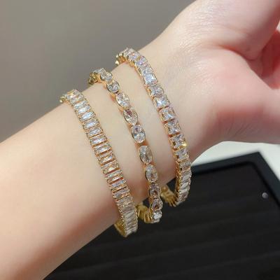 China Luxury Environmental Friendly 18K Gold Plated Zircon Geometric Tennis Crystal Bracelet Personality Sparkling Cubic Chain Bracelet For Women for sale