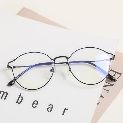 China 2022 New Design Fashion Daily Life Round Frame Metal Optical Glasses Women Personalized Computer Student Trend Anti-blue Light Glasses for sale