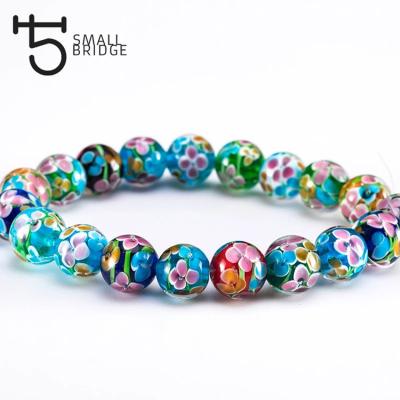 China Fashionable Clear Round 12mm Lampwork Murano Beads Women Necklace Jewelry Making Diy Transparent Flower Beads Wholesale for sale