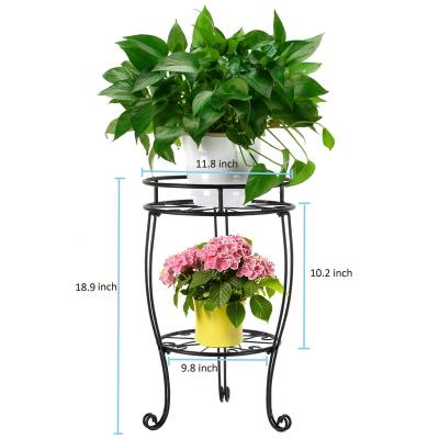 China Quality assurance minimalist single petals four flower stand black iron metal plant stand flower stand for sale