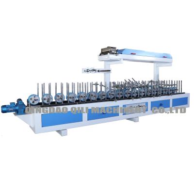 China Hotels Cold Glue Profile Wrapping Machine For Laminate Film On Curtain Rod for sale