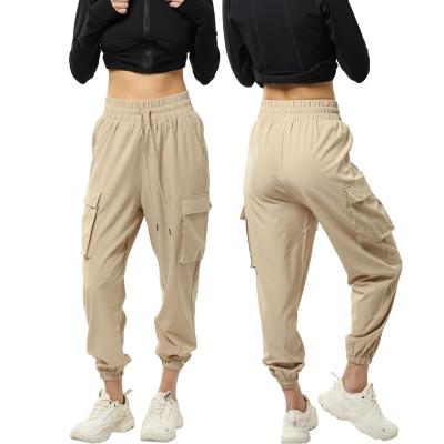 China Breathable High Quality Waterproof Custom Baggy Cargo Pants Women Plus Size Nylon Track Pants Casual Trousers For Ladies for sale