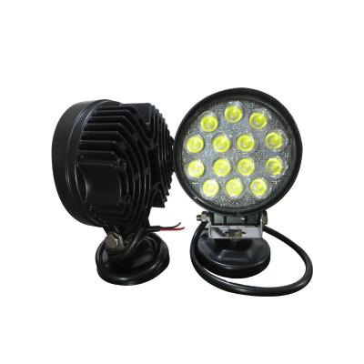 China Durable Hot Selling High Quality Truck Off Road Circular Headlight 42W Spotlight LED Car Work Light for sale