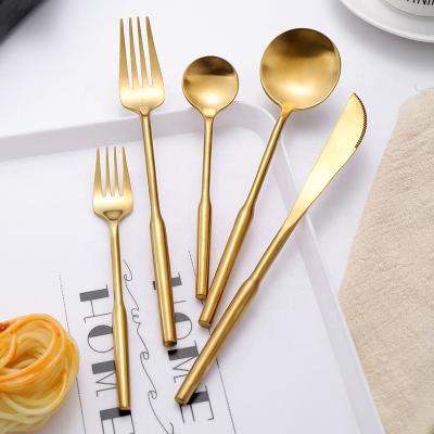 China 2021 Viable New Design With Houston Handle Black Gold Stainless Steel Cutlery Set for sale