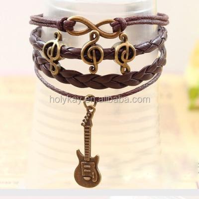 China Fashion music charm, fashion guitar jewelry bracelet pendent design for men for sale