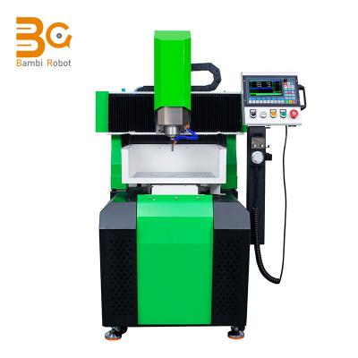 China Materials High Speed ​​4 Axis CNC Metal Vertical Machining Center Hard Milling Machine for sale