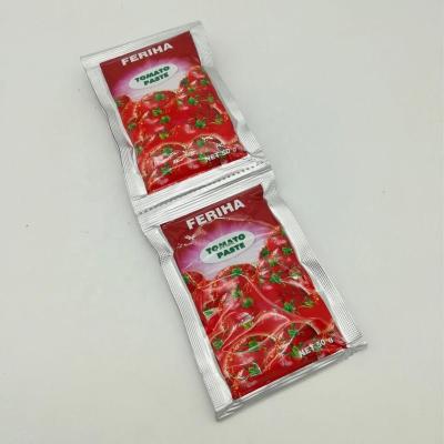 China 50g small sachet 10pcs stripe 28-30% brix pure natural tomato ketchup, tomato sauce, sachet tomato sauce producer for sale