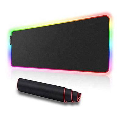 China Large HEATER Glowing RGB Extended Mousepad Soft Smooth Surface And Non-slip Rubber RGB Gaming Mouse Pad for sale