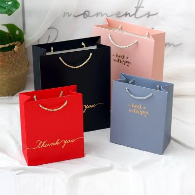 China Recycled Materials OEM Custom Paper Bags With Your Own Logo Shopping Paper Bags for sale