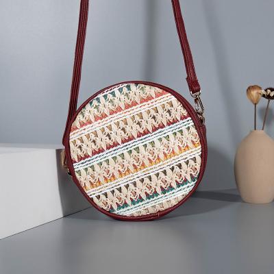 China 2021 New High Quality Fashion Boho Round Bucket PP Straw Shoulder Messenger Crossbody Bags Bali Summer Beach Purses and Handbags for sale