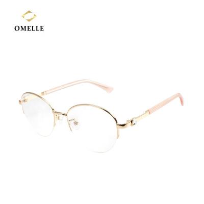 China For OMELLE 2021 Fashionable Round Glasses Half Rim Metal Eyeglasses Frames Optical for sale