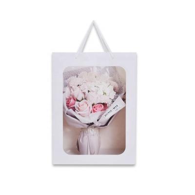 China Wholesale Recyclable Creative Clear Window Bouquet Flower Carrier Gift Packaging Portable Paper Bag for sale