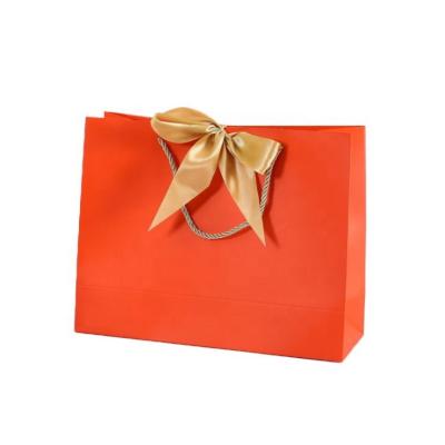 China Recyclable Custom Tissue Paper Bag Ribbon Closure Gift Logo Shopping Bag Clothing Packaging Paper Bag for sale