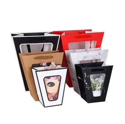 China Wholesale Recyclable Custom Logo Creative Design Portable Bouquet Flower Carrier Gift Packaging Paper Bag With Clear Window for sale