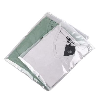 China BIODEGRADABLE PE Retail Clothing Storage Warnings Printed Clear Plastic Slider Zipper Bag for sale