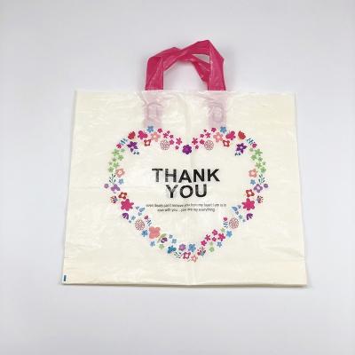 China Custom Logo Loop Handle 100% PE Wholesale Biodegradable Packaging Bag Plastic Shopping Bag for sale