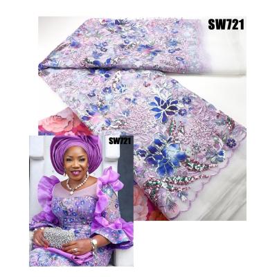 Cina Tissu di pizzo di sequine africane Tissu di pizzo di colore multi-netti ricamo Tulle Netto di pizzo Tissu di pizzo di matrimonio nigeriano Vestito di festa in vendita